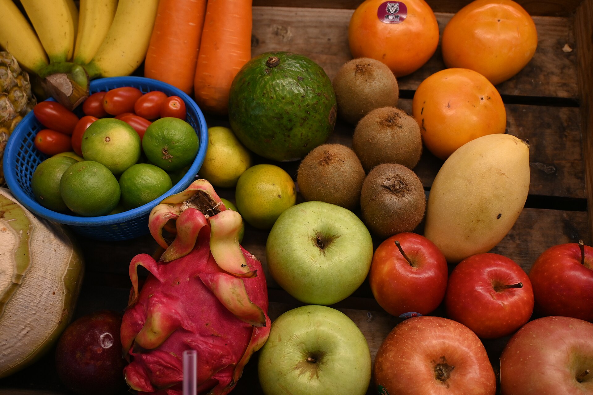 Fresh fruits & vegetables on wooden crate